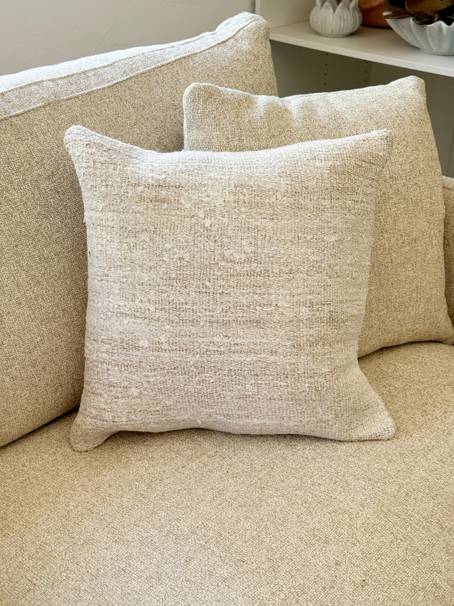 One of a kind beige pillow