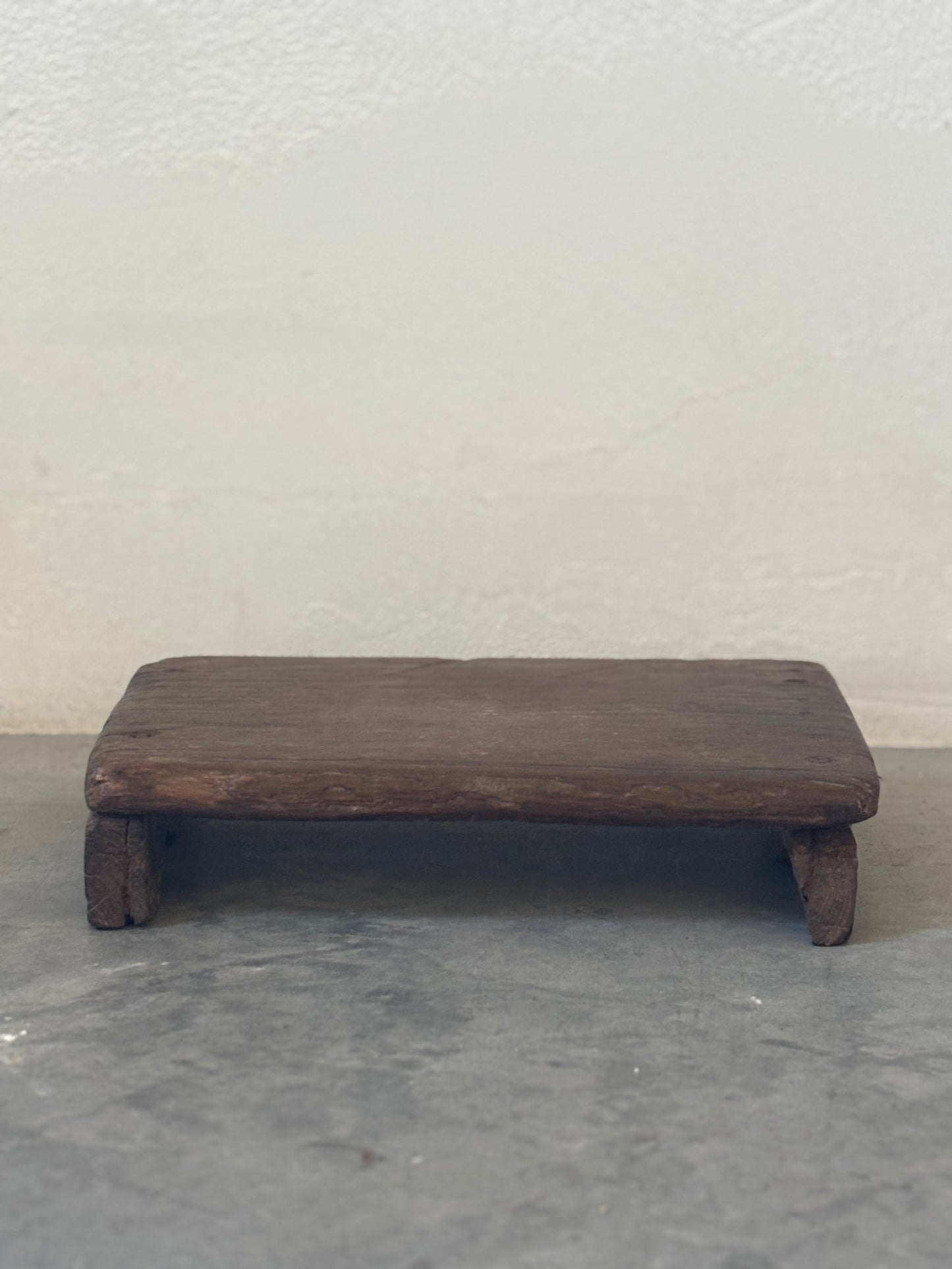 Dark Wood Riser with Unique Leg