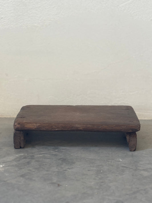 Dark Wood Riser with Unique Leg